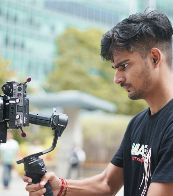 Man filming with professional camera and gimbal